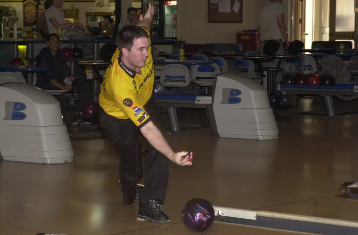 American professional bowler Sean Rash (PBA) mid-delivery during an exhibition